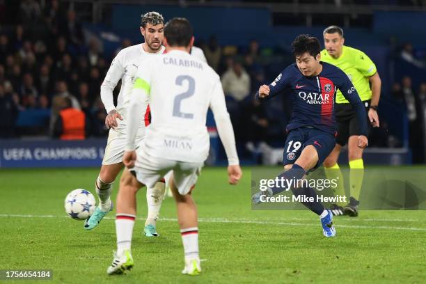 Lee Kang-In of Paris Saint-Germain scores the team's third goal during the UEFA Champions League match between Paris Saint-Germain and AC Milan at...