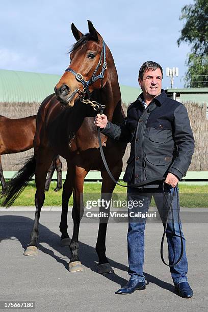 Trainer Mark Kavanagh poses for photo with Atlantic Jewel at todays announcement of 2013 Spring Carnival nominations at Flemington Racecourse on...