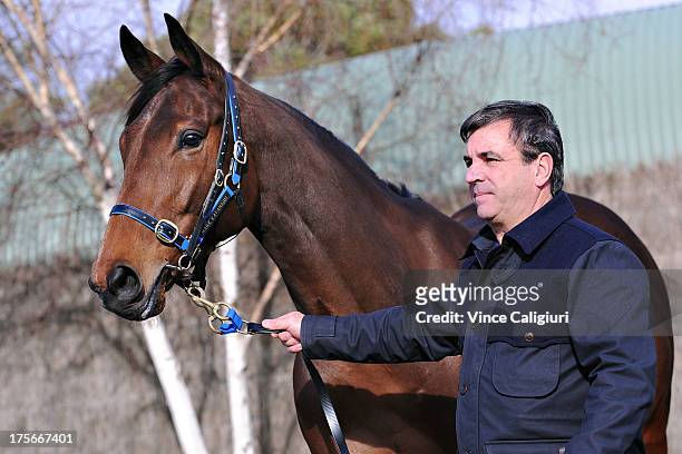 Trainer Mark Kavanagh poses for photo with Super Cool at todays announcement of 2013 Spring Carnival nominations at Flemington Racecourse on August...