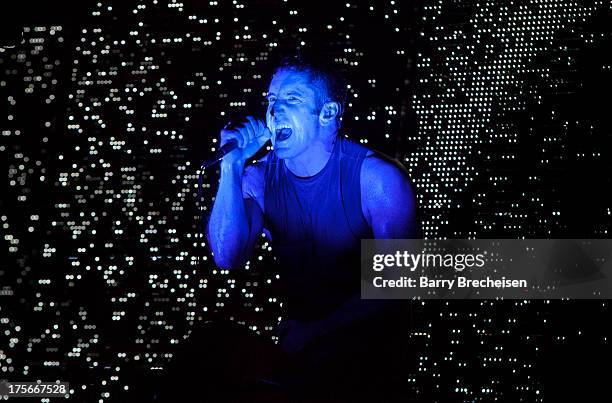 Trent Reznor of Nine Inch Nails performs during Lollapalooza 2013 at Grant Park on August 2, 2013 in Chicago, Illinois.