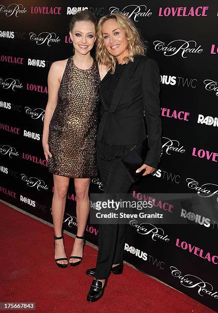 Amanda Seyfried and Sharon Stone arrives at the "Lovelace" - Los Angeles Premiere at the Egyptian Theatre on August 5, 2013 in Hollywood, California.