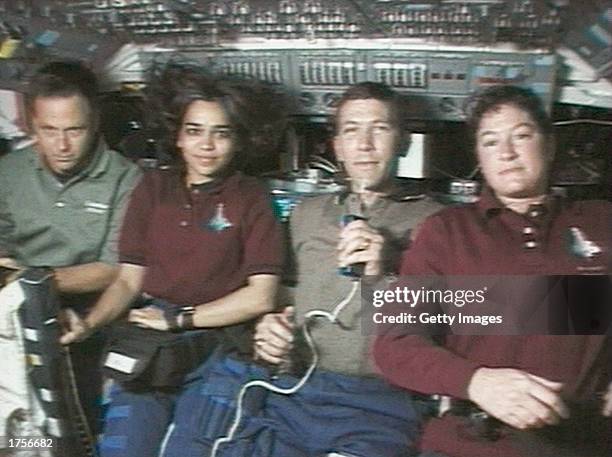 Astronauts on board the Space Shuttle Columbia speak during an interview from space, during mission STS-107, between 16th January and 1st February...