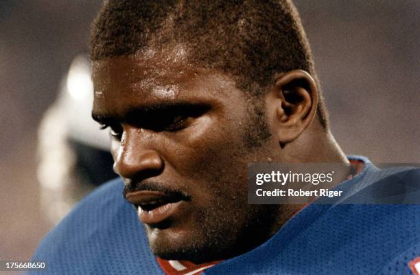 Lawrence Taylor of the New York Giants stands on the sidelines during an NFL game circa 1980's.