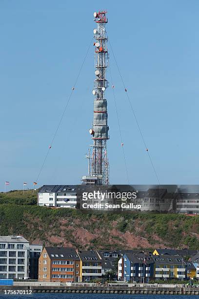 Military installation looms over Helgoland town on August 4, 2013 on Heligoland Island, Germany. Heligoland Island, in German called Helgoland, lies...