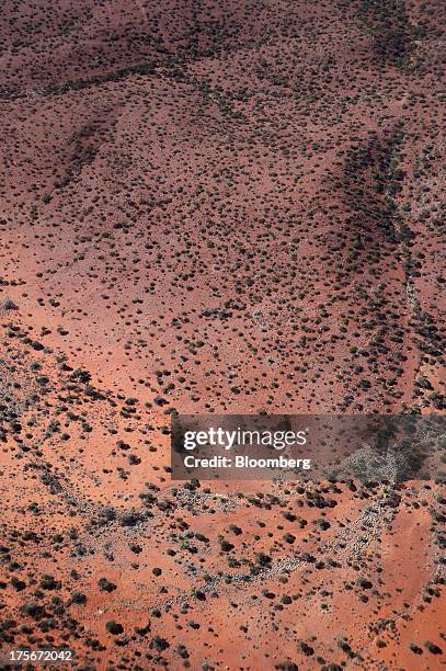 Red dirt and shrubs cover the landscape around the Sandfire Resources NL copper operations at DeGrussa, 559 miles north of Perth, Australia, on...