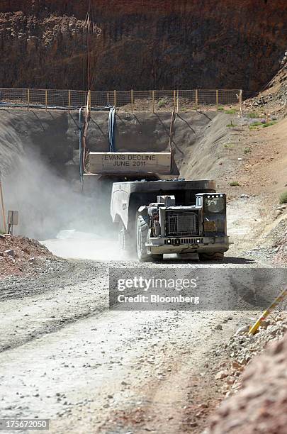 Truck loaded with freshly mined ore emerges from the box cut mine at the Sandfire Resources NL copper operations at DeGrussa, 559 miles north of...