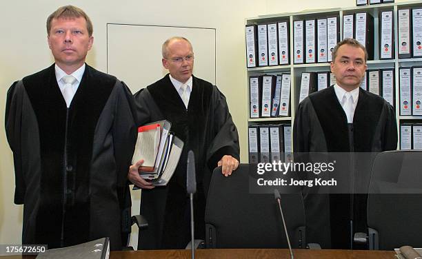 Judge Peter Lang , main-judge Manfred Goetzl and judge Konstantin Kuchenbauer arrive for day 39 of the NSU neo-Nazi murders trial at the...