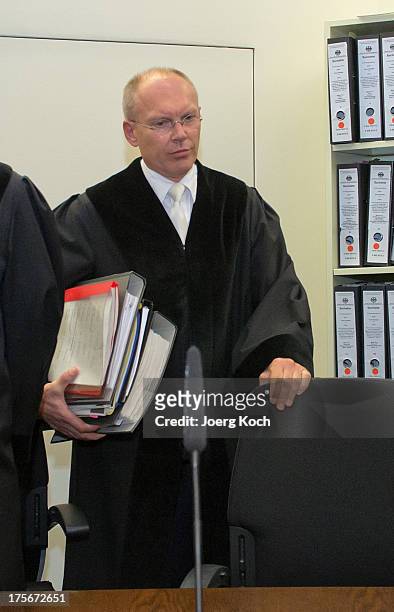 Main-judge Manfred Goetzl arrives for day 39 of the NSU neo-Nazi murders trial at the Oberlandgericht Muenchen courthouse on August 6, 2013 in...