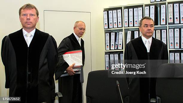 Judge Peter Lang , main-judge Manfred Goetzl and judge Konstantin Kuchenbauer arrive for day 39 of the NSU neo-Nazi murders trial at the...