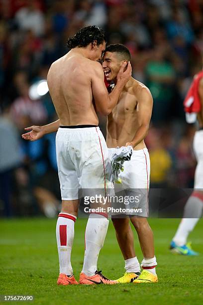 Zakaria Bakkali of PSV and Karim Rekik of PSV celebrates the victory after the UEFA Champions League Third qualifying round match, first leg between...