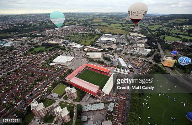 Hot air balloons fly over Ashton Gate, Bristol City FC's ground in Bristol as they launch for a dawn flight on August 6, 2013 in Bristol, England....