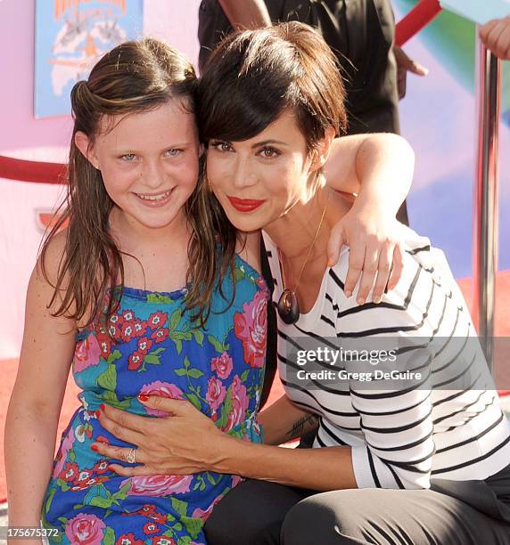 Actress Catherine Bell and daughter Gemma Beason arrive at the Los Angeles premiere of "Planes" at the El Capitan Theatre on August 5, 2013 in...