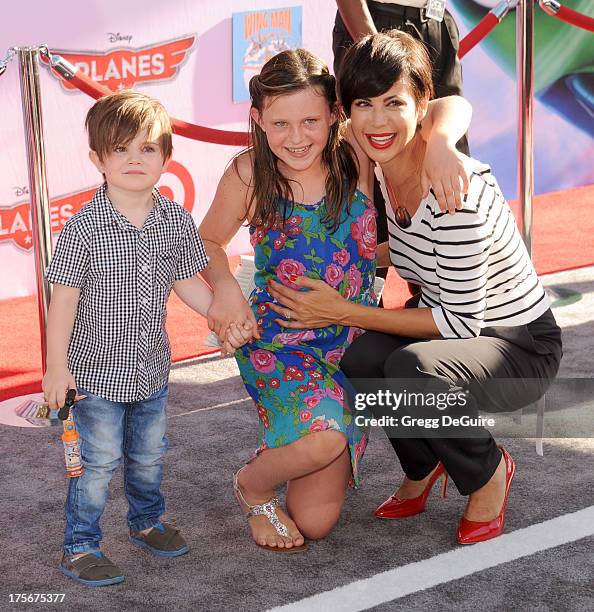 Actress Catherine Bell, son Ronan Beason and daughter Gemma Beason arrive at the Los Angeles premiere of "Planes" at the El Capitan Theatre on August...