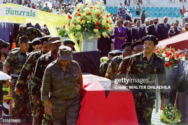 Members of Umkhonto we Sizwe, the ANC military wing , carry the coffin of the assassinated South African Communist Party leader Chris Hani, at the...