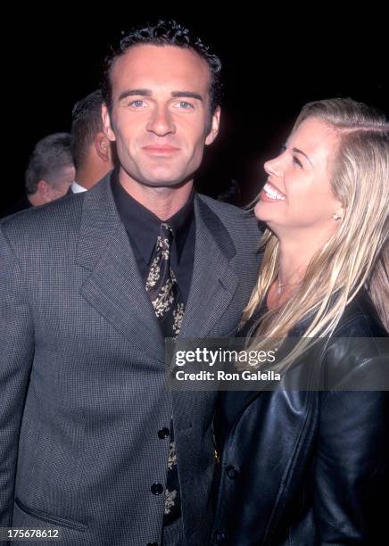 Actor Julian McMahon and actress Brooke Burns attend the "Cookie's Fortune" Century City Premiere on March 29, 1999 at the Cineplex Odeon Showcase...