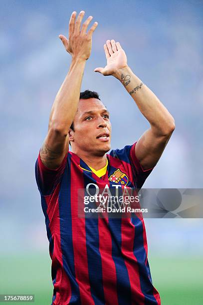 Adriano Correia of FC Barcelona acknowledges the fans during the FC Barcelona offcial presentation prior to a friendly match between FC Barcelona and...