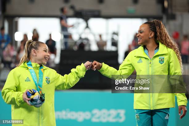 Silver medalist Flavia Saraiva of Team Brazil and Gold medalist Rebeca Andrade of Team Brazil pose on the podium for Artistic Gymnastics - Women's...