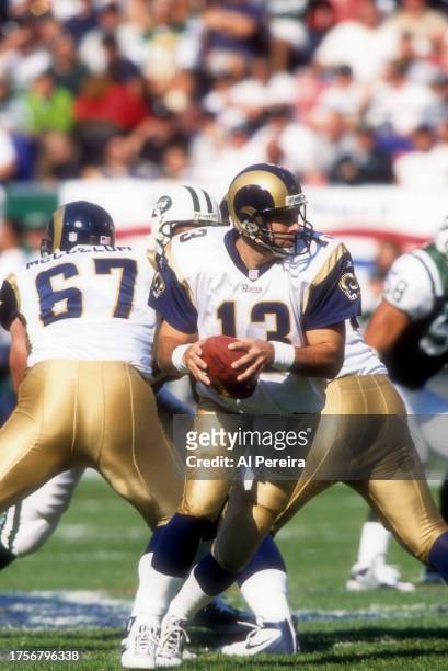 Quarterback Kurt Warner of the St Louis Rams calls a play in the game between the St Louis Rams vs the New York Jets on October 21, 2001 at The...