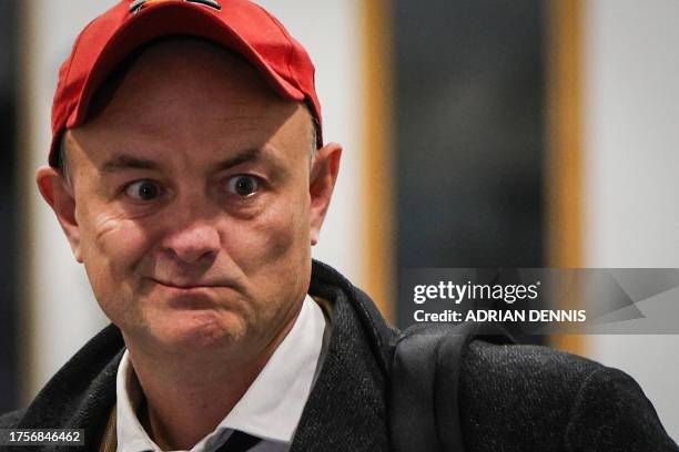 Former Number 10 special advisor Dominic Cummings reacts as he leaves after giving evidence to the UK Covid-19 Inquiry, in west London, on October...