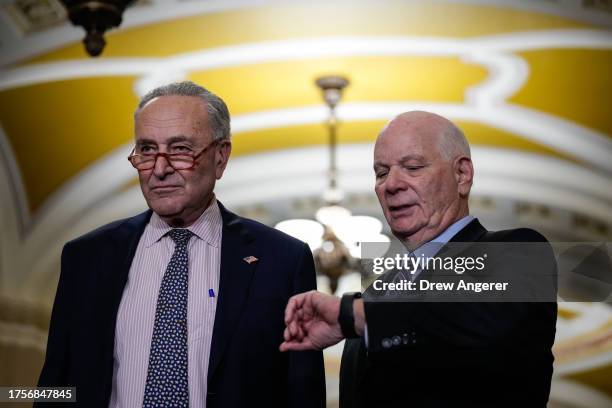 Senate Majority Leader Chuck Schumer and Sen. Ben Cardin wait to speak a news conference following a closed-door lunch meeting with Senate Democrats...