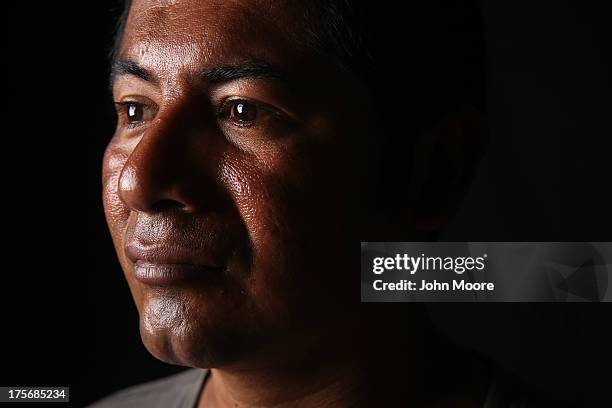 Guatemalan immigrant Jorge Enrique spends an evening at the Hermanos en el Camino immigrant shelter on August 5, 2013 in Ixtepec, Mexico. He said he...