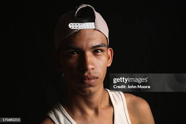 Salvadorian immigrant Carlos Josue spends a night at the Hermanos en el Camino immigrant shelter on August 5, 2013 in Ixtepec, Mexico. He said he...