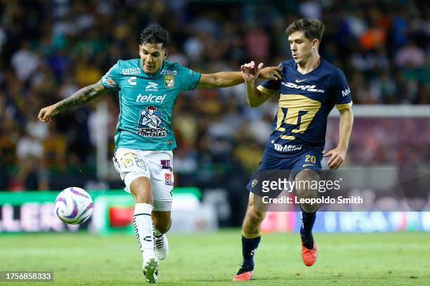 Lucas Romero of Leon competes for the ball with Santiago Trigos of Pumas UNAM during the 15th round match between Leon and Pumas UNAM as part of the...