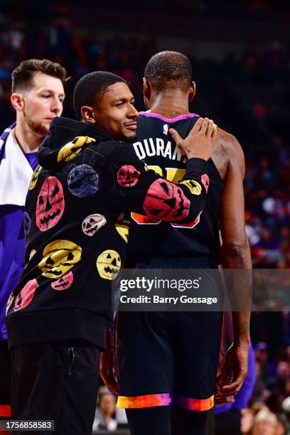 Bradley Beal of the Phoenix Suns pats Kevin Durant of the Phoenix Suns on the back during the game against the San Antonio Spurs on October 31, 2023...