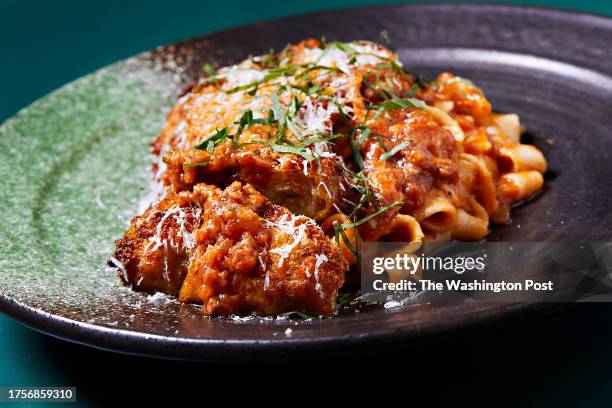 Chicken Parmesan with Allen Farm chicken, spicy pork ragu and Chinese cruller at Piccoletto photographed in Washington, DC on September 7, 2022..