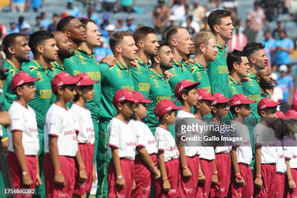 South Africa stand for the National anthem during the ICC Men's Cricket World Cup 2023 match between South Africa and New Zealand at MCA...
