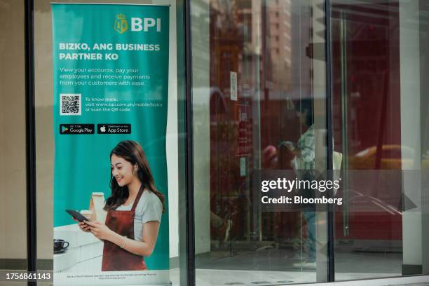 An advertising banner at a Bank of the Philippine Islands branch in Makati City, Metro Manila, the Philippines, on Tuesday, Oct. 31, 2023. The...