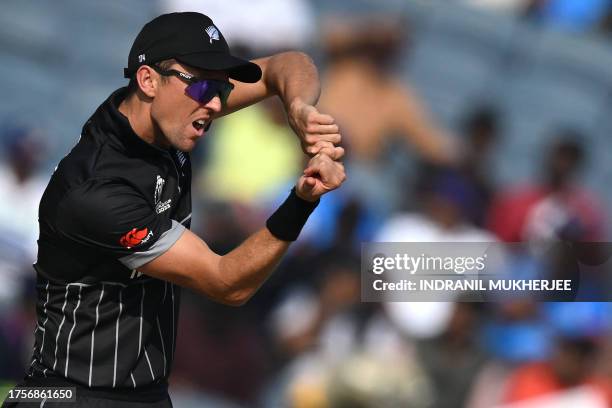 New Zealand's Trent Boult gestures during the 2023 ICC Men's Cricket World Cup one-day international match between New Zealand and South Africa at...