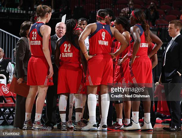 Head coach Mike Thibault of the Washington Mystics speaks in the huddle against the New York Liberty at the Prudential Center on August 6, 2013 in...