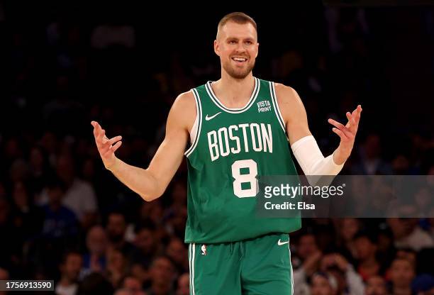 Kristaps Porzingis of the Boston Celtics celebrates his three point shot in the first quarter against the New York Knicks at Madison Square Garden on...