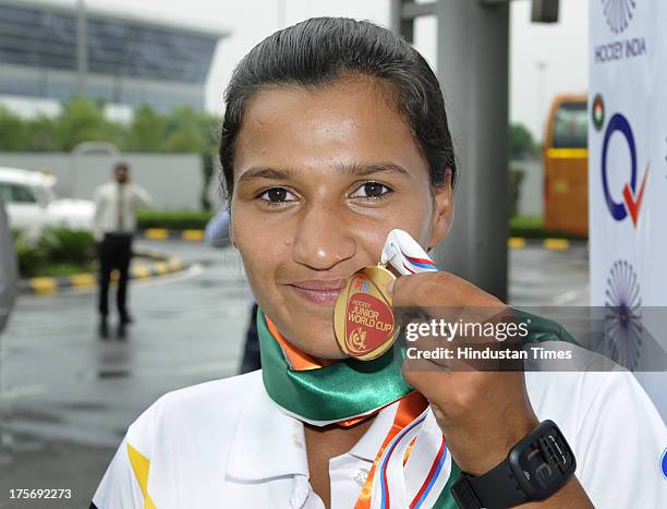 Rani Rampal, star player of Indian Women's Junior Hockey team which won bronze medal at Junior Hockey World Cup showing her bronze medal after...