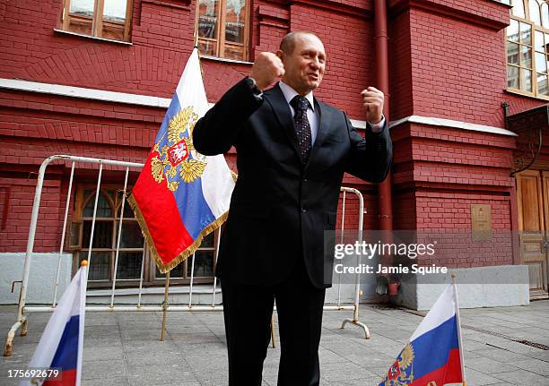 Vladimir Putin impersonator gestures outside the Iberian Gate and Chapel ahead of the 14th IAAF World Athletics Championships on August 6, 2013 in...