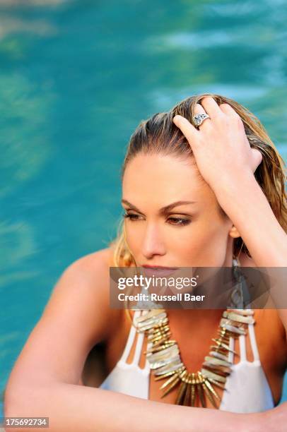 Entertainment journalist Ashlan Gorse is photographed for Coco Eco Magazine on July 1, 2013 in Malibu, California. PUBLISHED IMAGE.