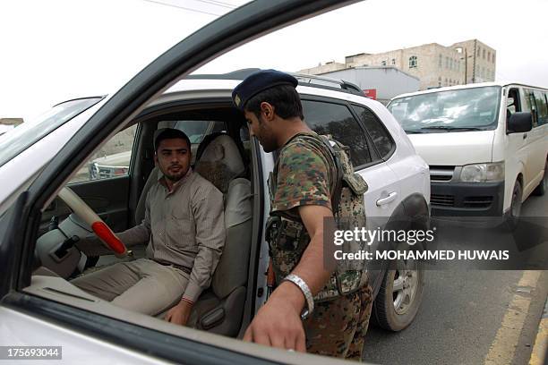 Yemeni soldiers controls a vehicle near Sanaa International Airport on August 6, 2013 in Yemen. The United States ordered Americans to leave Yemen...