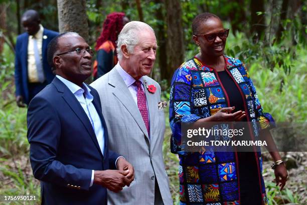 Britain's King Charles III gets a tour from the daughter of Nobel Peace Prize winner Professor Wangari Maathai, Wanjira Mathai , and professor...