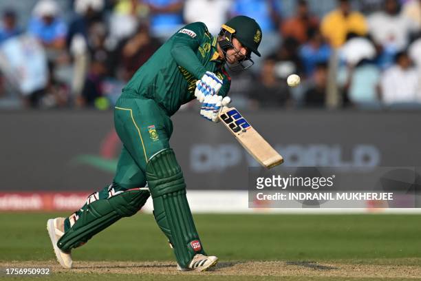 South Africa's Quinton de Kock plays a shot during the 2023 ICC Men's Cricket World Cup one-day international match between New Zealand and South...