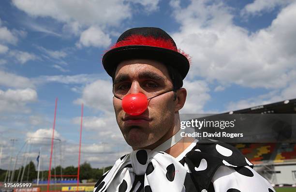 Kelly Brown of Saracens dresses as a sad clown prior to the alternative team photograph wearing fancy dress at the photocall held at Allianz Park on...