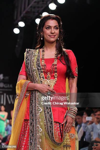 Juhi Chawla walks the runway at the Shringar show on day 3 of India International Jewellery Week 2013 at the Hotel Grand Hyatt on August 6, 2013 in...