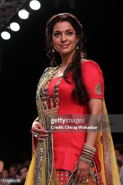 Juhi Chawla walks the runway at the Shringar show on day 3 of India International Jewellery Week 2013 at the Hotel Grand Hyatt on August 6, 2013 in...