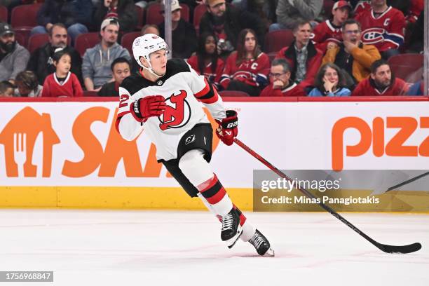 Curtis Lazar of the New Jersey Devils skates during the third period against the Montreal Canadiens at the Bell Centre on October 24, 2023 in...