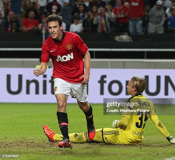 Angelo Henriquez of Manchester United celebrates scoring their first goal during the pre-season friendly match between AIK Fotboll and Manchester...