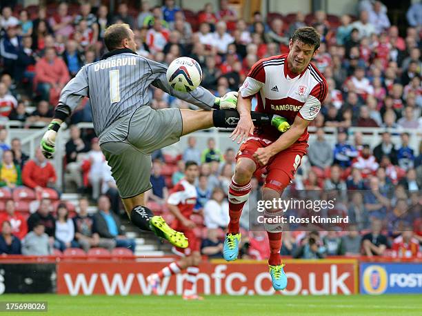 Lukas Jutkiewicz of Middlesbrough takes the ball past Ian Dunbavin of Accrinton Stanley to score the opening goal during the Capital One Cup First...