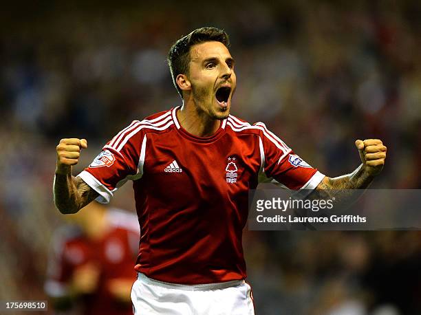 Matt Derbyshire of Nottingham Forest celebrates scoring the third goal during the Capital One Cup First Round match between Nottingham Forest and...