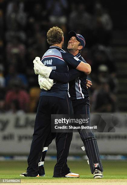 Steven Crook and David Murphy of Northamptonshire Steelbacks celebrate the wicket of Mark Stoneman of Durham, during the Friends Life T20 Quarter...