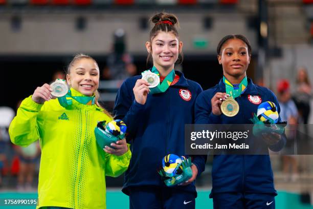 Flavia Saraiva of Brazil , Kayla Dicello of United States and Kaliya Lincoln of United States pose with medals during the medal ceremony in the...