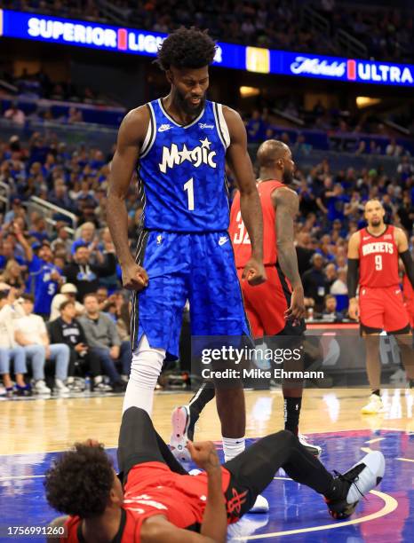 Jonathan Isaac of the Orlando Magic reacts to a play during the opening night game against the Houston Rockets at Amway Center on October 25, 2023 in...